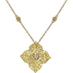 Adorn yourself with a piece of jewelry that speaks to your unique style and grace. The Mosaique Large Flower Necklace in Yellow Sapphire is a stunning statement piece that captures the essence of beauty and sophistication. With approximately 2.50 carats of round yellow sapphires set in 18K yellow gold, this necklace exudes elegance and charm. The center of the pendant features a white diamond that adds an element of luxury to the overall design. The pendant itself measures 17mm x 17mm and hangs Luxury Yellow Multi-stone Jewelry, Luxury Diamond Pendant Necklace With Jewels, Elegant Flower-shaped Large Pendant Jewelry, Elegant Flower Shaped Large Pendant Jewelry, Elegant Floral Large Pendant Jewelry, Yellow Flower-shaped Formal Jewelry, Formal Yellow Flower-shaped Jewelry, Exquisite Multi-stone Necklace, Gold Brilliant Cut Flower Shape Necklace