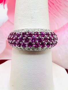 18K White Gold Diamond 0.60ct & Pink Sapphire Cocktail Ring Size 7.75 A perfect gift for your loved one for any special occasion or holiday! Total Ring Weight: 6.94g Ring Length: 23.57mm Ring Width: 22.63mm Gemstone: Diamond, Sapphire Total Diamond: 0.60ct Item will be placed into a gift box. * Gift Sapphire Ring With Pave Setting In Round Cut, Round Ruby Ring With Pave Setting For Gift, Gift Sapphire Ring With Pave Setting, Round Cut, White Gold Ruby Ring With Pave Setting, Round Cut Sapphire Ring With Pave Setting As Gift, Fine Jewelry Ruby Ring With Pave Setting For Anniversary, Ruby Ring With Diamond Pave Setting As A Gift, Diamond Ruby Ring With Pave Setting As Gift, Anniversary Ruby Ring With Pave Setting