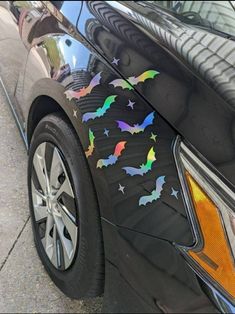 a car with bats painted on it's side