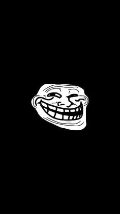 an image of a troll face in the dark