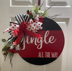 a red and black door hanger that says,'jungle all the way '