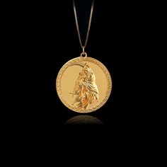 Our Gold Santa Muerte Pendant, crafted in the USA from real solid gold, embodies devotion and protection. This timeless piece showcases exquisite craftsmanship, designed to last a lifetime. Perfect for those seeking a unique and meaningful symbol, this pendant is a testament to enduring quality and elegance. PENDANT INFORMATIONThis pendant is made of real, solid gold.• Made in USA• Material: 14k or 18k solid gold• Finish: polished• Height: 1.13" (29 mm) x Width: 1" (26 mm)• Pendant weight: appro 14k Gold Medallion For Ceremonial Use, Ceremonial 14k Gold Medallion Jewelry, Ceremonial Yellow Gold Coin Jewelry, Ceremonial Symbolic Yellow Gold Jewelry, Ceremonial 14k Gold Amulet Jewelry, Elegant Ceremonial Coin Jewelry, Ceremonial 14k Gold Round Pendant Jewelry, Gold Jewelry With Certificate For Gift, Gold Jewelry With Certificate As A Gift