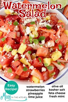 watermelon salad in a white bowl with limes on top