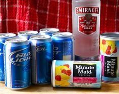 several different types of sodas and cans on a table