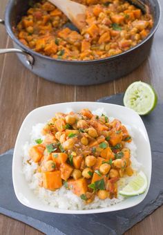 a white plate topped with rice and chickpeas