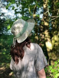 "The 'Emmy' hat, one of my bestsellers.   Made from a beautiful green fern print linen,with an olive green linen contrast.   the shape and silhouette of the 'Emmy' hat is very flattering, offering good facial coverage from the suns rays, with a linen tie feature, which if needed also works to slightly tighten the hat size, for those windy days.  The brim width is 9cm at the front scooping to 7cm at the back, with a cut away collar back to offer freedom of movement,  to help stop the hat catching Bohemian Bucket Hat For Travel, Green Curved Brim Bucket Hat For Travel, Bohemian Bucket Hat For Garden Party, Bohemian Outdoor Hats With Upf 50+, Bohemian Outdoor Hat With Upf 50+, Green Sun Hat With Upf 50+, Eco-friendly Summer Travel Hat, Eco-friendly Hat With Short Brim For Spring, Lightweight Bohemian Hat For Travel