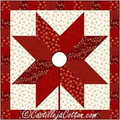 a red and white quilted star pattern with the center piece cut out to look like an ornament