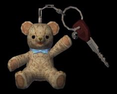 a teddy bear with a blue bow tie and a keychain attached to it