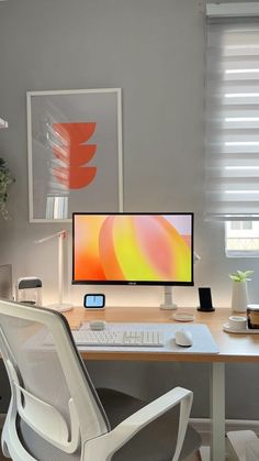 a desk with a computer monitor, keyboard and mouse