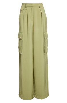 Cargo-style pockets lend practical appeal to high-waist pants kept free-flowing with a wide-leg silhouette. 34" inseam; 26" leg opening; 14 1/2" front rise; 18" back rise (size 8) 83% rayon, 17% nylon Dry clean Imported Spring Utility Wide Leg Pants, Green Wide Leg Pants With Cargo Pockets For Spring, Spring Wide-leg Parachute Pants With Pockets, Green Cargo Wide Leg Pants For Spring, Chic Full-length Pants With Patch Pockets, Spring Parachute Pants With Patch Pockets, Spring Wide Leg Utility Pants, Spring Wide Leg Parachute Pants With Side Pockets, Summer Workwear Pants With Flap Pockets