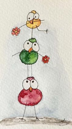 three birds standing on top of each other with flowers in their beaks and eyes