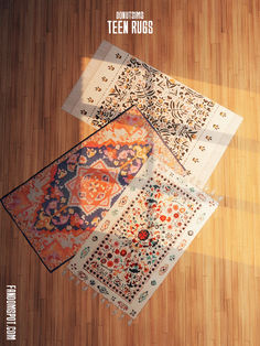 four different rugs sitting on top of a wooden floor