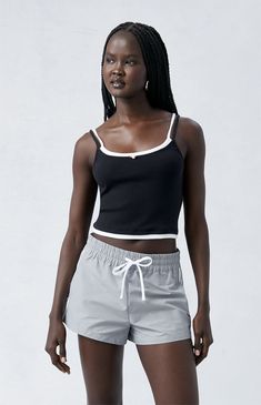 Stay cool and casual with PacSun's Gray Track Shorts. These comfy shorts not only bring a pop of color to your wardrobe but also feature a relaxed fit and sporty side stripe details, making them perfect for both lounging and staying active.


	Solid color track shorts
	11.25" rise
	2.5" inseam
	Drawstring waistband
	Side stripes
	Side hand pockets
	Relaxed fit
	62% cotton, 38% nylon
	Machine washable
	Model is wearing a size small
	Model measurements: 5’7.5” height, 29.5” bust, 23.5” waist, 36” hips Staying Active, Track Shorts, Comfy Shorts, Side Stripe, Drawstring Waistband, Stay Cool, Casual Outfit, Pacsun, Model Measurements