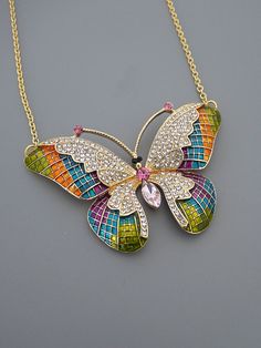 "Vintage Jewelry - Statement Necklace - Vintage Inspired Necklace - Butterfly Necklace - Gold Necklace - Colorful Necklace Crystal Necklace This is a gorgeous vintage inspired butterfly necklace! Encrusted with sparkling crystals in pink, and purple with the wings painted with a myriad of colors with enamel. The pendant hangs from a gold plated chain. A stunning statement piece. Chloe says, \"Wear it and feel fabulous!\" You can choose the chain length you would like at checkout.. The pendant is Elegant Multicolor Butterfly Necklace As Gift, Elegant Multicolor Butterfly Necklace As A Gift, Elegant Multicolor Butterfly Necklace Gift, Multicolor Butterfly Jewelry For Gifts, Multicolor Butterfly Jewelry Gift, Multicolor Butterfly Charm Necklaces, Multicolor Butterfly Charm Jewelry, Multicolor Butterfly Print Jewelry Gift, Handmade Multicolor Butterfly Necklace For Gift