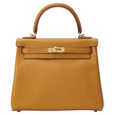 Hermès Kelly 25 in sesame and swift leather with gold hardware. The bag is unworn and comes as full set including the original receipt. Stamp Y (2020) Hermes Kelly 25, Kelly 25, The Bag, Handle Bag, Fashion Handbags, Full Set, Gold Hardware, Top Handle, The Original