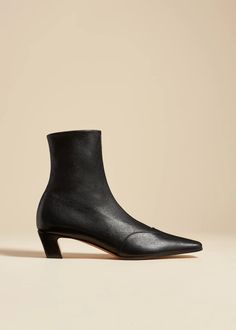 The Nevada Stretch Low Boot in Black Nappa Leather– KHAITE Luxury Black Mid-calf Boots, Classic Mid-calf Boots With Sculpted Heel For Fall, Luxury Mid-calf Boots For Fall, Khaite Boots, Ankle Stretches, Urban Cowboy, Low Boots, How To Stretch Boots, Cowboy Boot