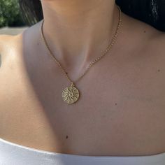 ❤DAINTY 18k GOLD PLATED SUN COIN NECKLACE ❤ A delicate gold plated chain with a COIN charm with a sun on it. Minimalist ,outstanding & eye catching piece of jewelry!! It is a great gift for your girlfriend/mother/sister or for yourself. Made with love in Greece :-) ✨ D E T A I L S * 40cm long plus 10cm extension chain * The chain is made of stainless steel  * The sun charm is made form 18k gold plated stainless steel 28mm * Nickel free ❤ For more similar items visit my shop www.etsy.com/your/sho Dainty Round Jewelry With Sun Design, 14k Gold Filled Charm Necklace With Coin Pendant, Gold Plated Dainty Medallion Necklace, Dainty Gold Plated Medallion Coin Necklace, Dainty Coin Medallion Necklace, Tarnish Resistant, Dainty Gold Plated Tarnish Resistant Medallion Necklace, Dainty Medallion Necklace For Everyday, Dainty 14k Gold Filled Tarnish Resistant Coin Necklace, Dainty Gold Plated Tarnish-resistant Medallion Necklace