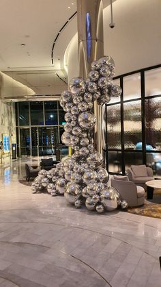 a large sculpture in the middle of a lobby