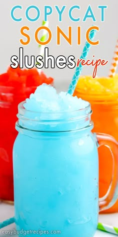 a blue mason jar filled with slushies and topped with a straw