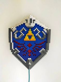 a clock made out of legos and beads