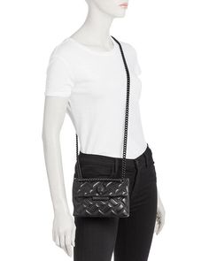 Adjustable crossbody strap, 12-21' drop.Strap can be worn single or doubled.Dimensions: 7.5'W x 2.5'D x 5'H.Snap flap closure.Interior slip pocket.Quilted leather detailing at front.Tonal hardware.Signature eagle head embellishment at front.Logo at back.Mannequin model measurements: 5'10' height, wearing a size 4 or small.Polyester lining.Leather or patent leather.Imported.Web ID: 4119116 Kurt Geiger Kensington Bag, Kurt Geiger Micro Bag, Micro Kurt Geiger, Kurt Geiger Mini Kensington Bag, Kurt Geiger Micro Kensington Bag, Mannequin Model, London Bags, Leather Detailing, Eagle Head