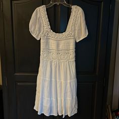 Jessica Simpson White Boho Mini Dress W Crochet Top. Elastic Back. Puff Sleeves. Sz Xs. Never Worn. Perfect Beach, Or Festival Dress Casual Crochet Dress With Short Sleeves For Summer, Casual Mini Dress With Crochet Trim, Spring Crochet Dress Short Sleeve For Day Out, Casual Fitted Crochet Dress For Day Out, White Cotton Mini Crochet Dress, White Mini Crochet Dress, White Cotton Crochet Mini Dress, White Fitted Mini Dress With Crochet Trim, Casual Mini Dress With Crochet Trim For Brunch