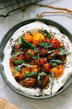 a bowl filled with food on top of a table