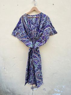 we pack our order in reusable bag , so basically we provide our customers a reusable bag , so they can use it for many days.... This Beautiful Hand Block Print Caftan or can be called as Tunic is made with super fine quality cotton and designs have been crafted by Hand Prints. Usage - Tunic, Gown, Maxi, Bikini Cover up, Beach Wear, Caftan etc. Fabric - 100% Cotton Color - Green  Pattern - Flower Size - Plus Size, can fit Up To 4XL Bust/chest size - Free Size ( Drawstring ) Length - 30",40",48" Inches (Approx.) * It has Adjustable Drawstring Waist. * V Shape Neck Which is 8" Inches Deep. * Very comfortable to wear in both hot or cold weather. International buyers are responsible for their countries duties and taxes. Note:- Please share your contact no for Delivery DHL , Fedex and ARAMEX Traditional Wrap Kaftan For The Beach, Multicolor Wrap Kaftan For Vacation, Multicolor Wrap Kaftan For The Beach, Printed Wrap Kaftan For Vacation, Purple Short Sleeve Kaftan For Beach, Blue Bohemian Wrap Kaftan, Blue Wrap Kaftan For The Beach, Purple Free Size Kaftan For Vacation, Blue Wrap Kaftan For Festivals