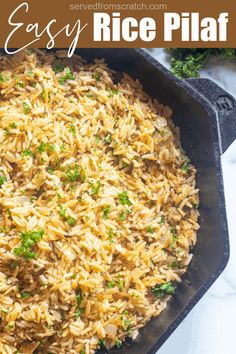 a skillet filled with rice and vegetables on top of a white counter next to parsley