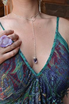 Wear this beautiful Amethyst lariat necklace and be reminded that you are everything you need! A "drop of divine" wisdom to guide you daily as the true leader of your own unique path. Trust yourself and keep moving fiercely forward. Amethyst is known for its calming and protective properties, helping to soothe the mind and bring clarity to your thoughts. Wearing this necklace is more than just an accessory; it's a reminder to stay centered, embrace your inner peace, and walk your path with confi