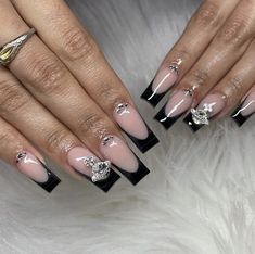 Black French Tip Nails With Planet Gem, Nail Inspo Planet Charm, Saturn Gem Nails, Saturn Nail Charm, French Tips With Planet Charm, Black Sagittarius Nails, Saturn Charm Nails, Nails With Saturn Charm, Black And White Nails With Charms