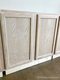 an unfinished cabinet door is shown with wood graining on the bottom and side panels