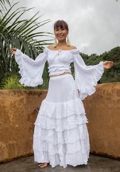 TOP: Bohemian 100% natural cotton blouse. Can be worn as off shoulders and cover shoulders 2 colors white and off white. Elastic around neckline and elastic waist trim with lace. Wide sleeve with layered unfinished hem. Double fabric in the front bust not in the back. Measurements: TOP Bust 32 up to 46 inches. Waist 22 stretch up to 42 inches. neckline 26 stretch up to 64 inches Sleeve 17 and 21 inches ( high low style) Length 15 inches. ---------------------------------------------------------- Peasant Style Flowy Maxi Skirt With Ruffles, Peasant Style Flowy Ruffled Maxi Skirt, Fitted Peasant Skirt With Ruffles, Peasant Style Ruffled Maxi Skirt, Peasant Style Flowy Skirt With Ruffles, Peasant Cotton Skirt With Ruffles, White Cotton Skirt With Attached Cancan, Spring Peasant Fitted Maxi Skirt, Spring Peasant Style Fitted Maxi Skirt