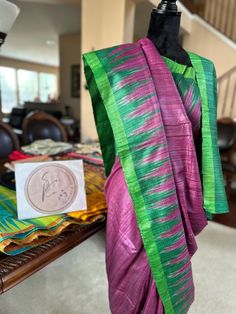 A beautiful raw Tussar silk saree in purple and green. Odisha silk with temple border, comes with a stitched blouse Purple Handloom Chanderi Pre-draped Saree, Festive Purple Tussar Silk Pre-draped Saree, Purple Raw Silk Pre-draped Saree With Cutdana, Purple Raw Silk Handloom Saree, Purple Handloom Tussar Silk Blouse Piece, Purple Tussar Silk Handloom Traditional Wear, Purple Cotton Silk Handloom Saree, Purple Handloom Tussar Silk Traditional Wear, Purple Handloom Cotton Silk Saree