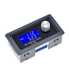 an alarm clock with two usb outlets on the front and back sides, showing time