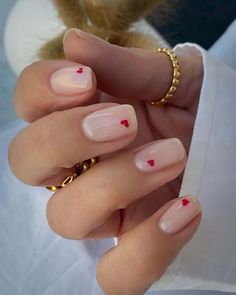 A minimalist nail design is elegantly displayed by a delicate hand, each nail adorned with a single red heart accent. Experience the beauty of simplicity by clicking here to see more.via@lindseysbeautylounge1 Natural Nail Designs, Red Valentine, Romantic Nails, Heart Nail, Heart Nail Art, Short Coffin Nails, Red Nail Designs, Heart Nails, Nail Designs Spring