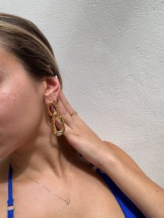 Gold Dangle Earrings - These unique boho make quite the statement! Perfect for dressing up a nice top or on a beach vacation! These interlocking double hoops absolutely stun. 18k gold & stainless steelLength: 11x11cmWeight: about 3oz- water/sweat resistant- gold filled- Style: Minimalist Modern Gold Hoop Earrings For Summer, Trendy Single Earring For Beach, Gold Pierced Hoop Earrings For Beach, Trendy Single Earring For Beach Jewelry, Chic Hoop Earrings For Beach, Chic Dangle Jewelry For The Beach, Chic Dangle Jewelry For Beach, Trendy Gold Hoop Earrings For Beach, Chic Gold Hoop Earrings For Summer