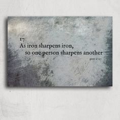 a metal plaque with the quote as iron sharpes iron, so one person sharpes another