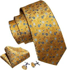 This complete tie set is the perfect way to add style and sophistication to any look. Crafted from high-quality silk, the dark green paisley print is timeless and luxe. A matching handkerchief and cufflinks complete the set, making it an essential addition to any man's wardrobe. Silk Blend + Polyester Imported Tie closure Machine Wash 1*Silk Tie; 1*Pocket Square; 1 Pair Cufflinks Length 59 inches /150cm; Width 3.35 inches /8.5cm; Handkerchief: 9 inches x 9 inches(23cm x 23cm); Cufflink Diameter: Classic Gold Sets For Business, Classic Gold Formal Sets, Classic Gold Sets For Formal Occasions, Elegant Brown Business Sets, Elegant Brown Formal Sets, Winter Knit Hats, White Leaf, Tie Set, Mens Green