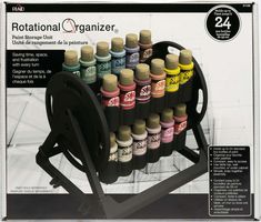 an image of a holder with bottles on it for art and crafting supplies in the store