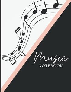 the music notebook is open and has musical notes on it