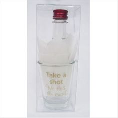 a clear glass bottle with a red cap and the words take a shot in it