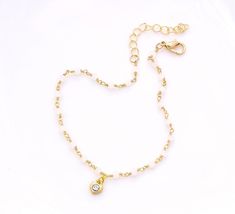 14k gold plated beaded chain with lovely heart charm and crystal chain bracelet/anklet Materials: gold plated metal (Lead, Nickel and Chromium free) Product Dimension: 7.5 inches in length, 9.5 inches with extender Customized length: complementary length adjustment is included, please message for the desired length at the checkout page Package content: two chains and a jewelry pouch Color may vary slightly depending on lighting or viewing monitor/devices. Gift packaging: a personalized note in a Elegant Gold Crystal Bracelet With Lobster Clasp, Gold Crystal Bracelet With Beaded Chain For Gift, Elegant Gold Crystal Bracelet With Beaded Chain, Chain Charm Bracelet, Layered Fashion, Gold Charm Bracelet, Free Product, Crystal Chain, Gold Fashion