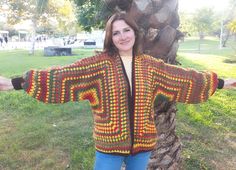 ✨️ You will love this autumn colorful, hand-crocheted cardigan. You'll never want to take it off, and I guarantee you'll get lots of compliments.  ✨️A unique piece with bohemian influences. It will be a great gift option for your loved ones.  ✨️It is knitted with cotton and premium acrylic threads. ✨️If you want a casual and oversized look, I recommend you order one size larger than your own size. Or if you can give me your own measurements, I can also work with custom sizes for you. Please feel Fall Festival Crochet Cardigan, Fall Festival Granny Square Cardigan, Multicolor Crochet Patterns For Fall, Hexagon Cardigan, Crocheted Cardigan, Colorful Crochet, Cardigan Crochet, Crochet Cardigan, Jumpers And Cardigans