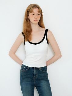 This is a feminine and modern top by sisterhood that is made out of high quality and sturdy material. With distinctive mood of the design and comfortable wear, you can style it for your comfortable daily outfit.- Color contrasting line and V neckline- Fixed inner chest padding- Modern and minimal mood Stretch Tops With Contrast Color, White Stretch Tops With Contrast Trim, White Stretch Top With Contrast Trim, Fitted White Top With Contrast Trim, White Fitted Top With Contrast Trim, Trendy Fitted Tops With Contrast Trim, Trendy Tops With Contrast Color, Sleeveless Stretch Top With Contrast Color, Stretch Sleeveless Top With Contrast Color