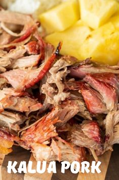 sliced meat on a cutting board with pineapples and other food items in the background