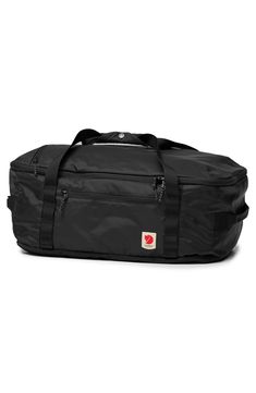 Whether you're heading out for a workout or the weekend, this duffle bag will have you covered with its water-resistant exterior and roomy interior. A multistrap design lends plenty of styling options so you can easily convert it to a backpack. Top zip-around closure Convertible carry straps; two side carry handles Exterior side zip pocket Interior zip pocket 210-denier shell 100% recycled polyamide Imported Waterproof Functional Travel Bag For Overnight Trips, Functional Waterproof Travel Bag For Overnight Trips, Black Nylon Weekender Bag For Outdoor, Everyday Waterproof Functional Duffle Bag, Functional Black Waterproof Duffle Bag, Durable Functional Black Duffle Bag, Functional Waterproof Weekender Bag For Overnight Trips, Sporty Waterproof Gym Bag For Overnight Trips, Practical Waterproof Gym Bag For Overnight Trips