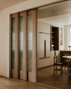 an open sliding glass door in a kitchen