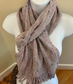 This hand woven scarf in white blended with many other colors will keep you warm all winter long.  The warp is hand spun rambouillet wool and sari silk and the weft is fine merino and silk. Bohemian Handwoven Alpaca Scarves, One Size Handwoven Alpaca Shawl, Handwoven Scarves For Fall, Bohemian Handwoven Pashmina Scarves, Hand Woven Scarf, Woven Scarf, Handwoven Scarf, Woven Scarves, Sari Silk