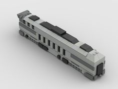 a white and black train is shown on a gray background